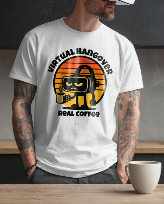 a male model wearing a white t-shirt with a graphic of a VR headset with a grumpy face holding a coffee cup "virtual hangover real coffee"