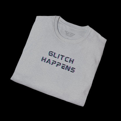 Folded gray t-shirt with 'GLITCH HAPPENS' text 