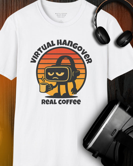 white t-shirt with a graphic of a VR headset with a grumpy face holding a coffee cup "virtual hangover real coffee" text surrounds the graphic